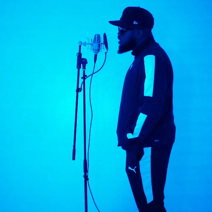 An artist recording at the microphone at Fly Away recording studio in Montreal