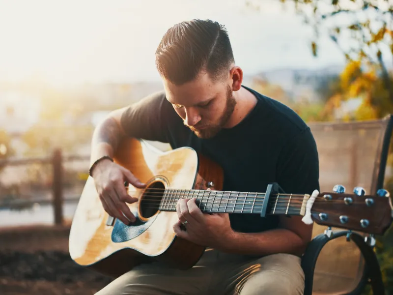 electric vs acoustic for beginner