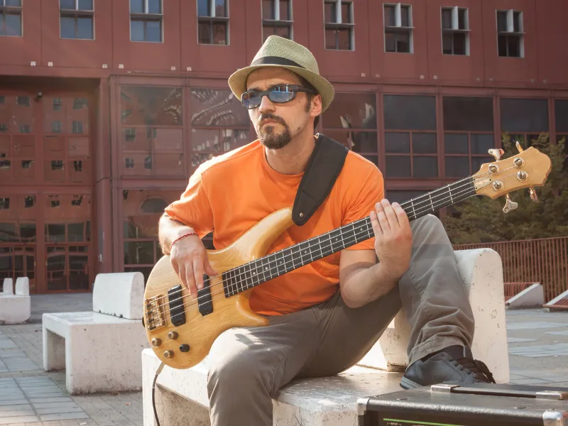 How To Hold A Bass Guitar Sitting Position