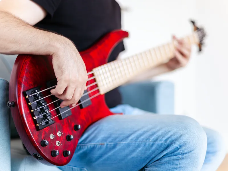 The Best Guide On How To Hold A Bass Guitar 5 Easy Tips (2023)