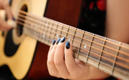 How To Play Guitar With Long Nails: Learn The Easy Way (2023)