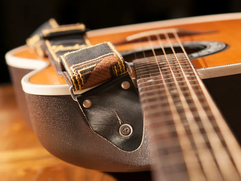 How To Put On A Guitar Strap: A Quick & Easy Guide
