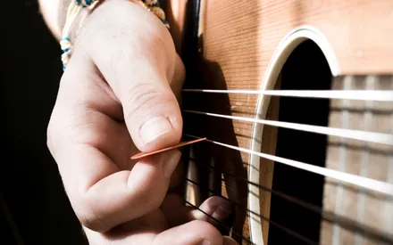 A Quick Guide On How To Strum A Guitar Like A Pro! (2023)