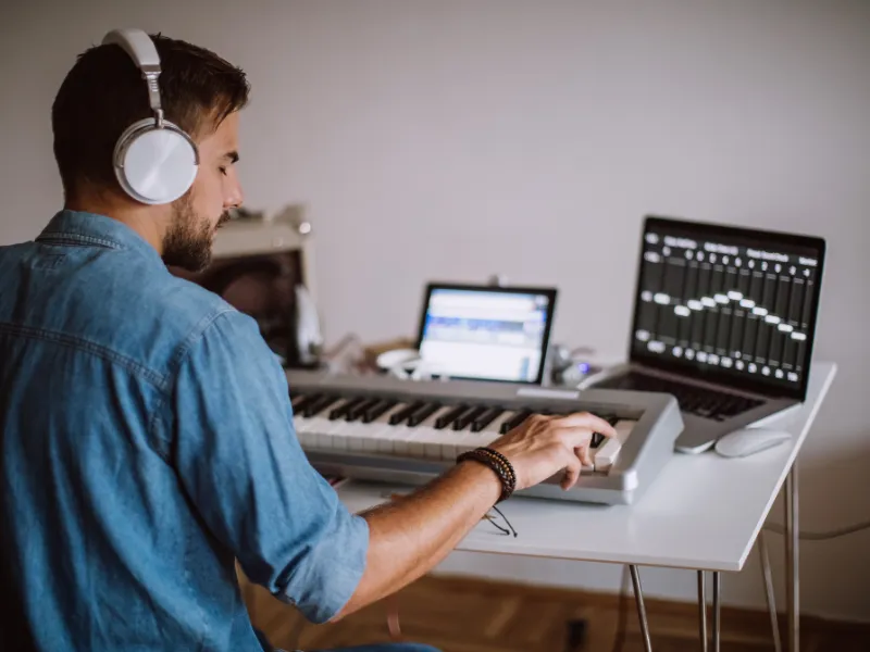 What do producers do in music?