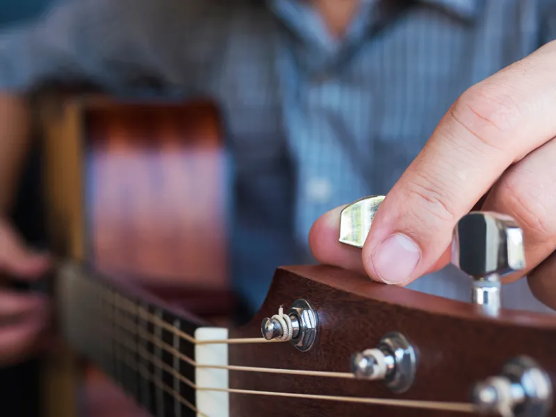 tuning guitar